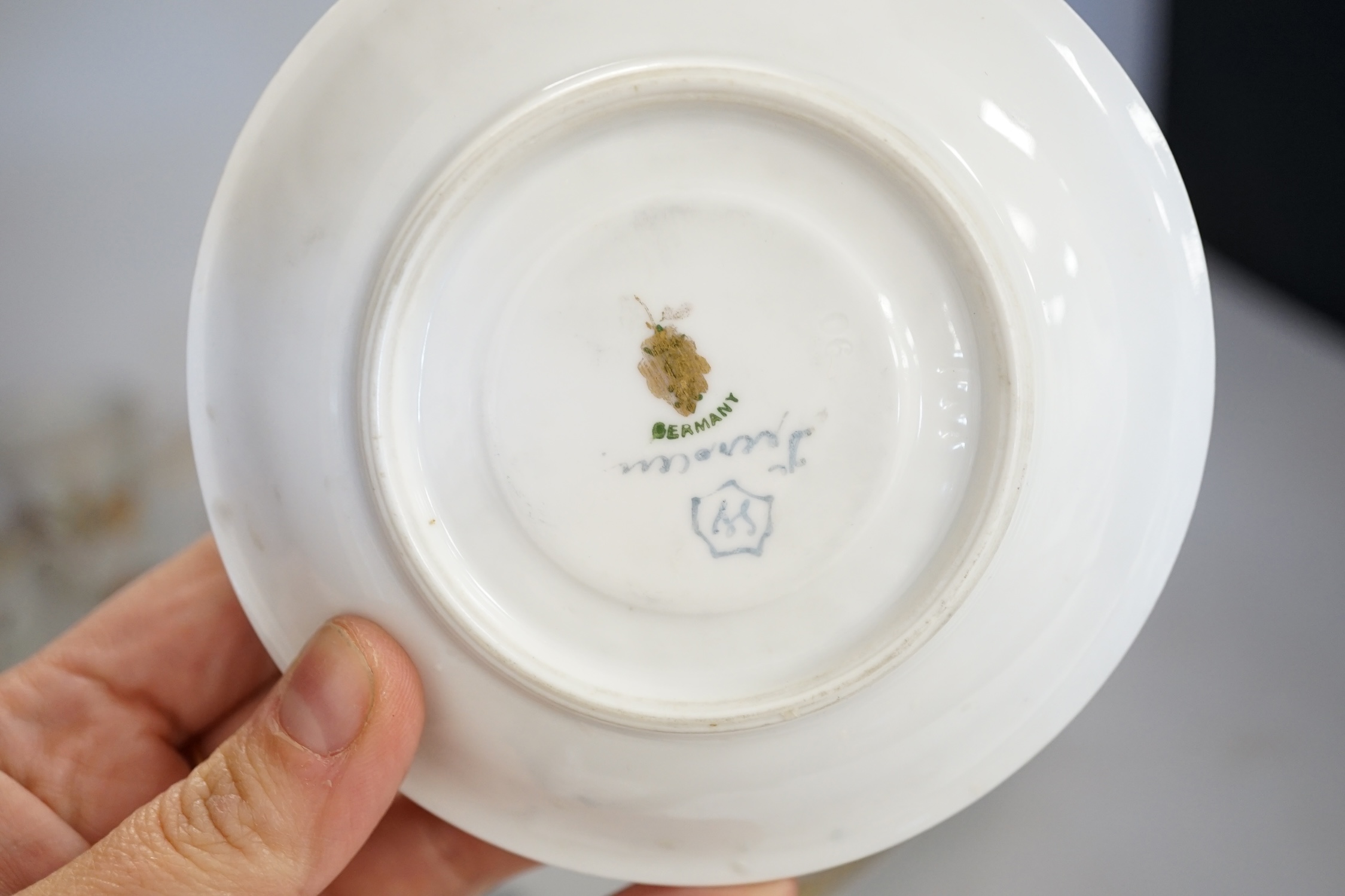 A Dresden floral painted tray and other coffee wares, 39cm diameter. Condition - poor to fair